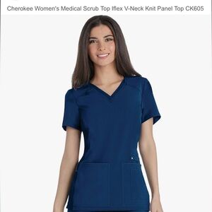 Navy blue Cherokee iFlex set. Includes shirt, pants, and jacket